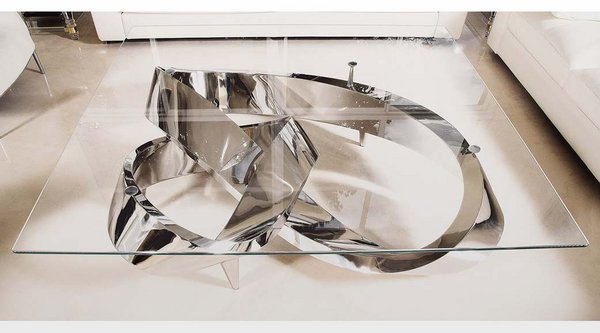 Table "Moebius Rings" in stainless steel with glass plate.