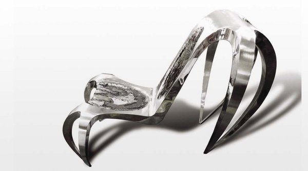 "Spider" in stainless steel.